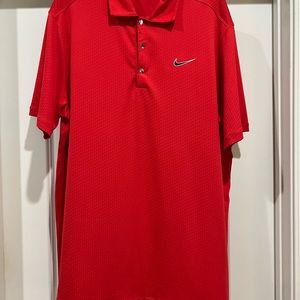 Nike red polo shirt.